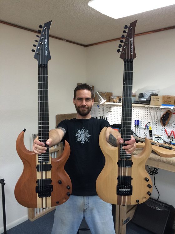 holding Esoterik guitars copy